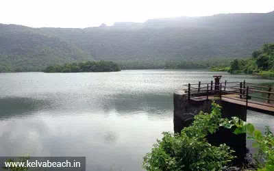 Calm waters of Kelva Dam nestled in lush green hills near Palghar