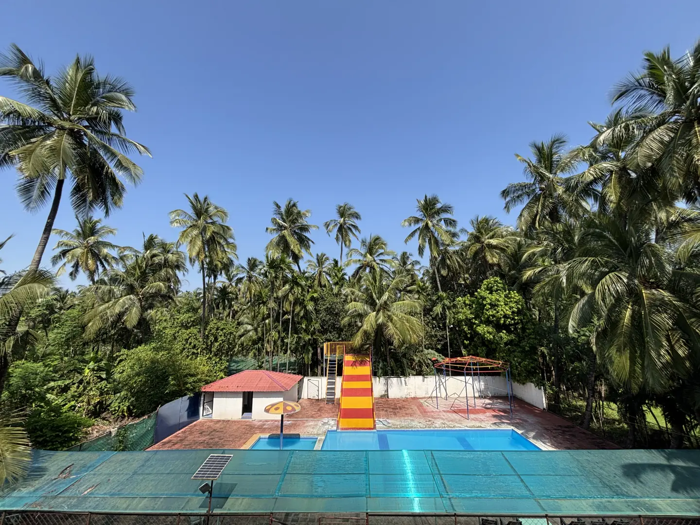 Relaxing poolside area with elegant seating at Raj Resort