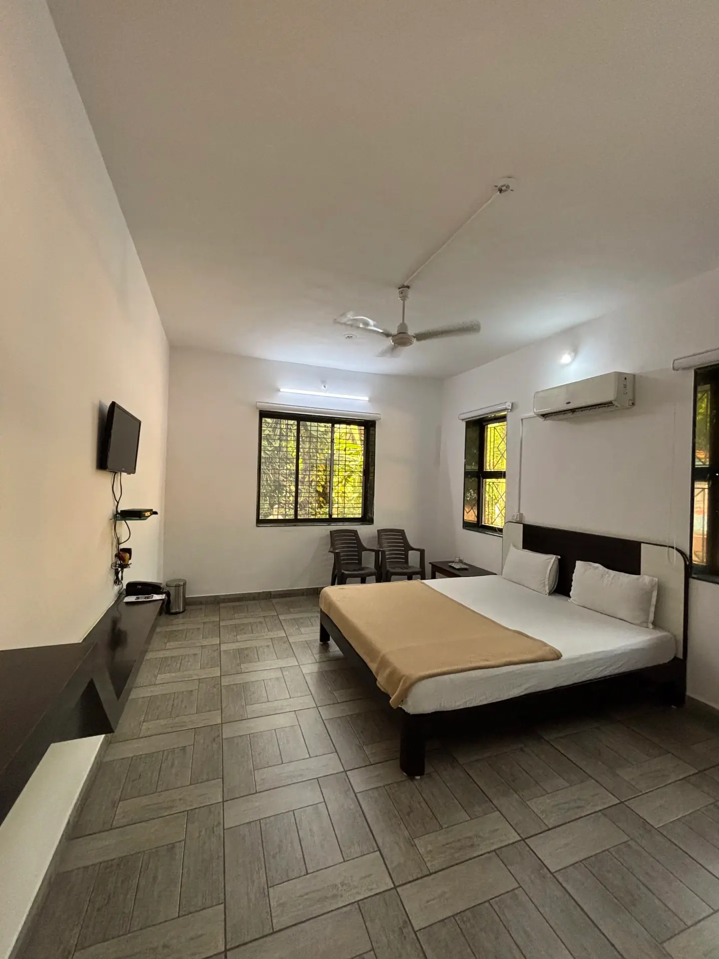 Spacious AC Economic Room offering comfortable beachside accommodation at Raj Resort Kelva