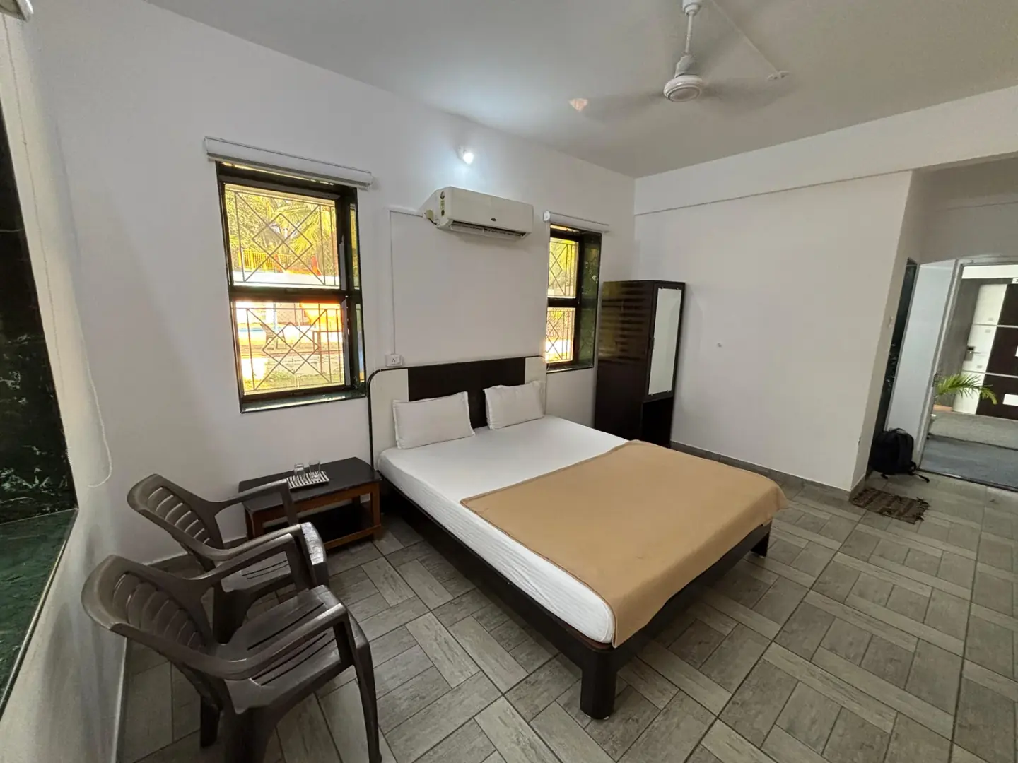 Lush green gardens and beautifully landscaped lawns at Raj Resort Palghar